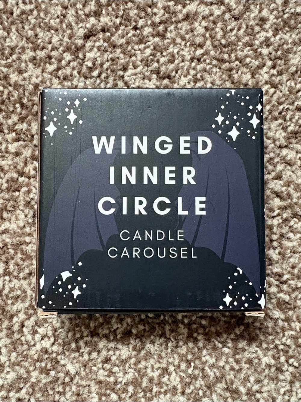 bookish box winged inner circle candle carousel
